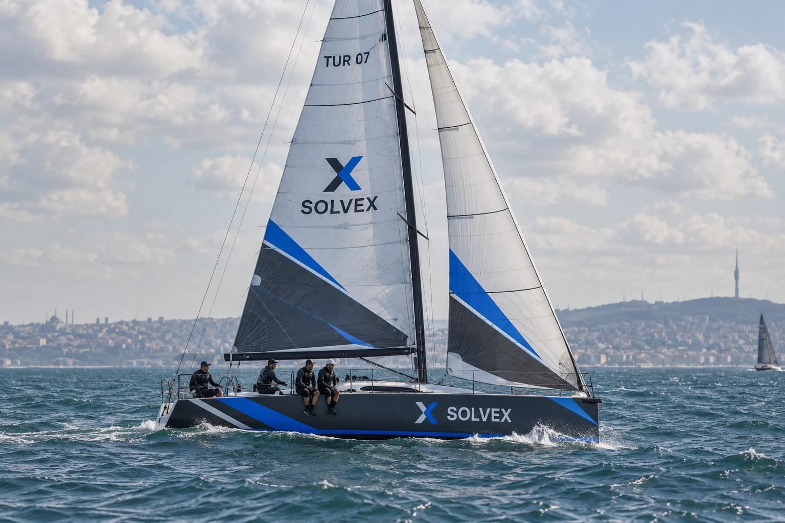 Solvex sailing concept: a crew aboard a graphite and cobalt racing yacht on the Bosphorus.